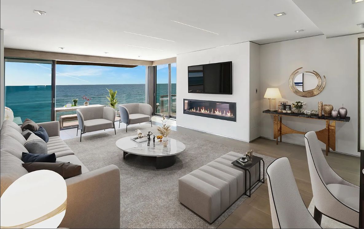 Modern oceanfront living room with fireplace